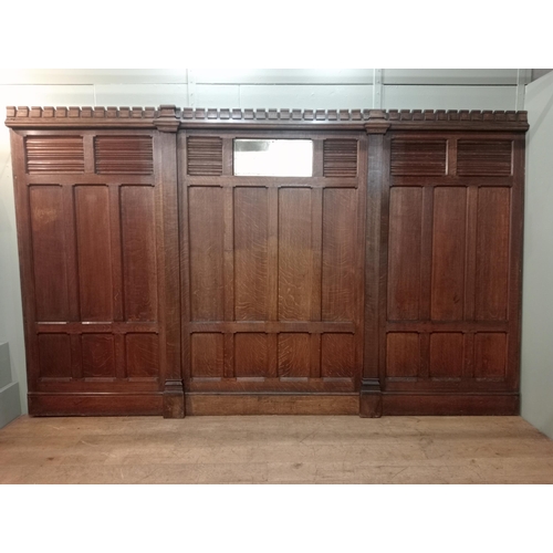 889 - Collection of solid oak panelling with linen fold design centre brass plate {H 218cm x W 354cm x D 1... 