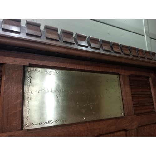 889 - Collection of solid oak panelling with linen fold design centre brass plate {H 218cm x W 354cm x D 1... 