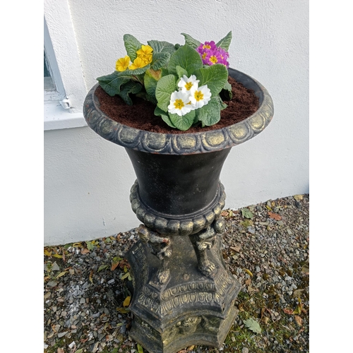 895 - Pair of cast iron planters - urns {H 110cm x W 46cm x D 46cm }.