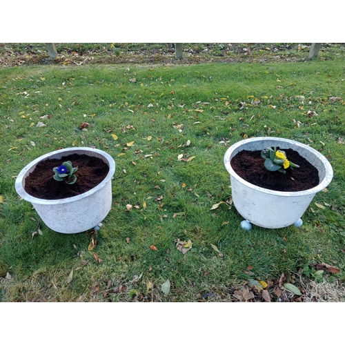 897 - Pair of cast iron pots on ball feet {H 34cm x D47cm }.