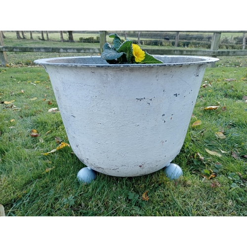 897 - Pair of cast iron pots on ball feet {H 34cm x D47cm }.