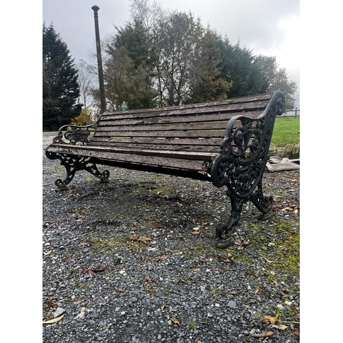 863 - 19th C. cast iron garden bench with wooden slats {78 cm H x 190 cm W x 82 cm D}.