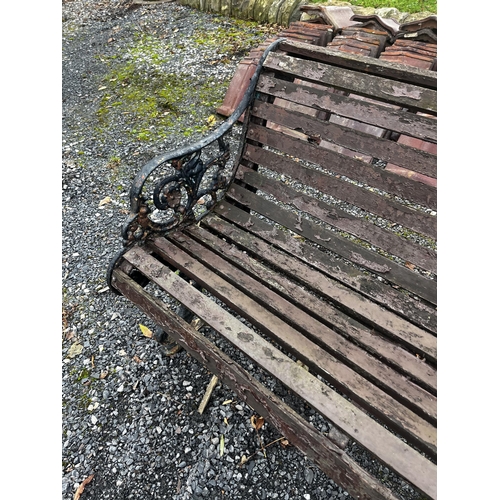 863 - 19th C. cast iron garden bench with wooden slats {78 cm H x 190 cm W x 82 cm D}.