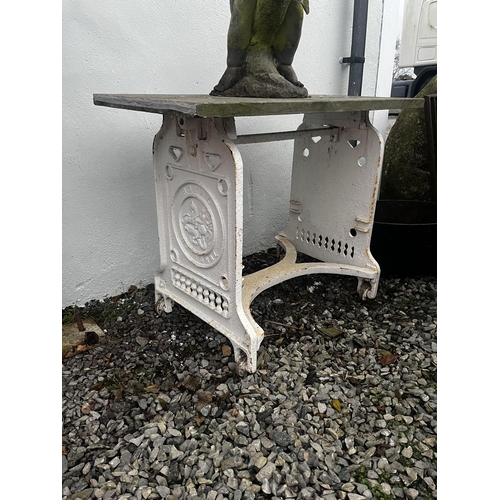 906 - 19th C. cast iron garden table with slate top {75 cm H x 100 cm W x 50 cm D}.