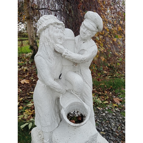 915 - Stone couple water feature {H 76cm x W 35cm x D 35cm }.