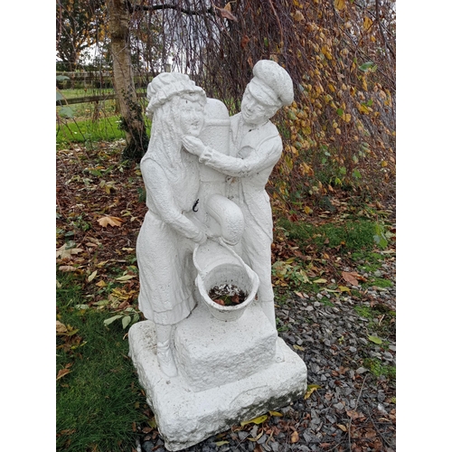 915 - Stone couple water feature {H 76cm x W 35cm x D 35cm }.