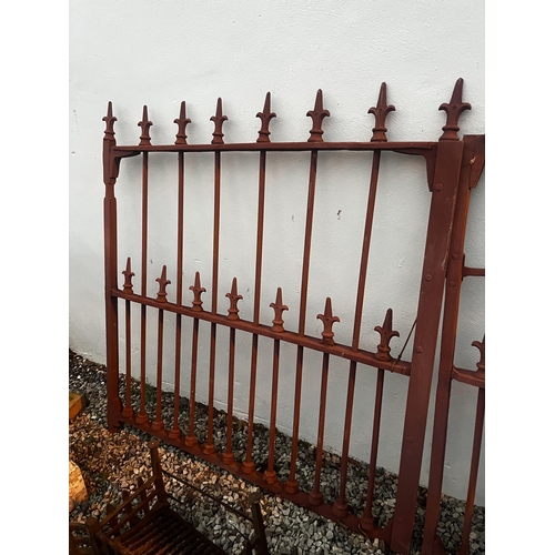 920 - Pair of Victorian cast iron gates {145 cm H x 275 cm W}.