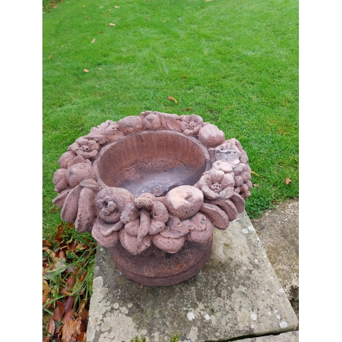 859 - Pair of good quality moulded terracotta planters decorated with fruit {30 cm H x 36 cm Dia.}.