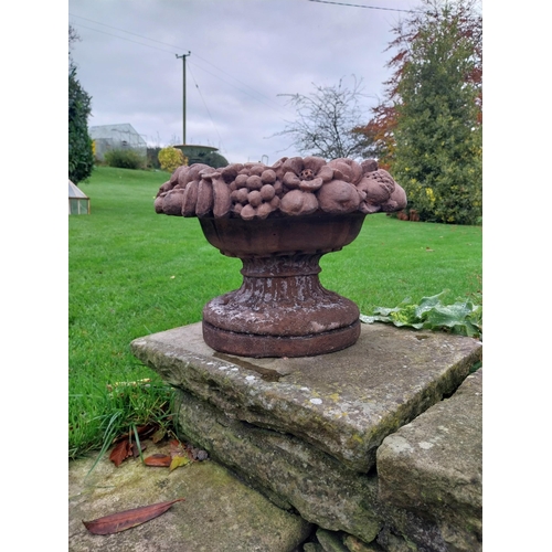 859 - Pair of good quality moulded terracotta planters decorated with fruit {30 cm H x 36 cm Dia.}.