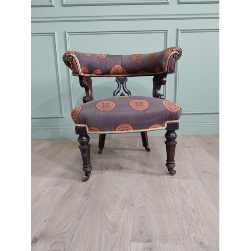 149 - Victorian mahogany and upholstered armchair raised on turned legs and brass castors {78 cm H x 77 cm... 