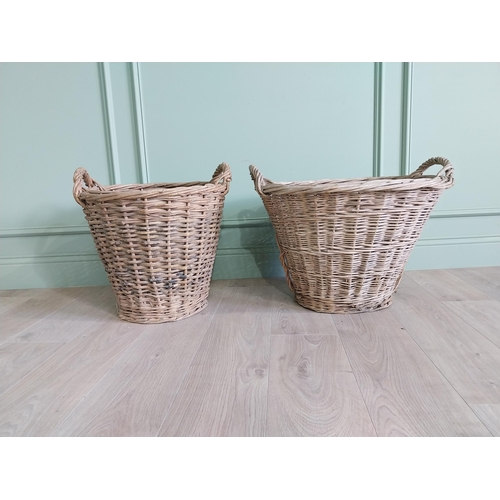 255 - Two early 20th C. wicker baskets {40 cm H x 50 cm W x 48 cm D and 47 cm H x 67 cm W x 54 cm D}.