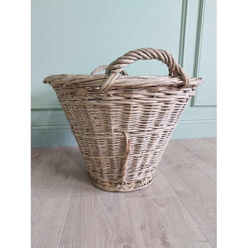 255 - Two early 20th C. wicker baskets {40 cm H x 50 cm W x 48 cm D and 47 cm H x 67 cm W x 54 cm D}.