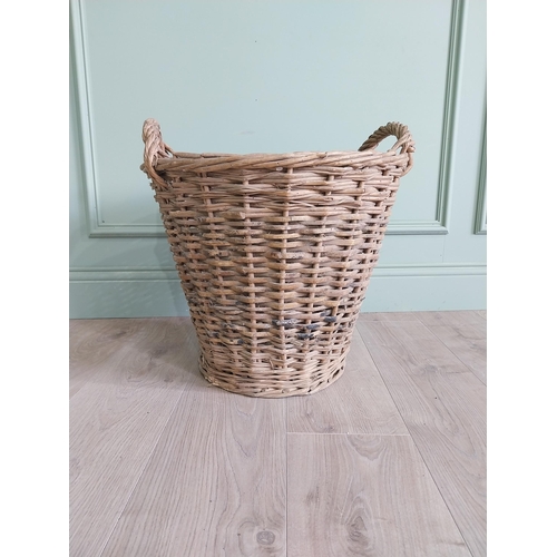 255 - Two early 20th C. wicker baskets {40 cm H x 50 cm W x 48 cm D and 47 cm H x 67 cm W x 54 cm D}.