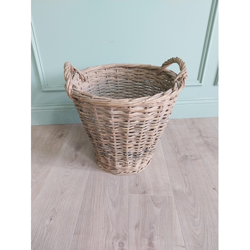 255 - Two early 20th C. wicker baskets {40 cm H x 50 cm W x 48 cm D and 47 cm H x 67 cm W x 54 cm D}.