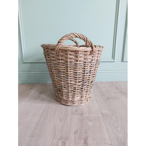 255 - Two early 20th C. wicker baskets {40 cm H x 50 cm W x 48 cm D and 47 cm H x 67 cm W x 54 cm D}.