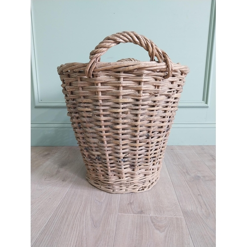 255 - Two early 20th C. wicker baskets {40 cm H x 50 cm W x 48 cm D and 47 cm H x 67 cm W x 54 cm D}.