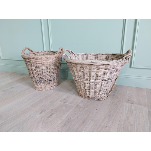 255 - Two early 20th C. wicker baskets {40 cm H x 50 cm W x 48 cm D and 47 cm H x 67 cm W x 54 cm D}.