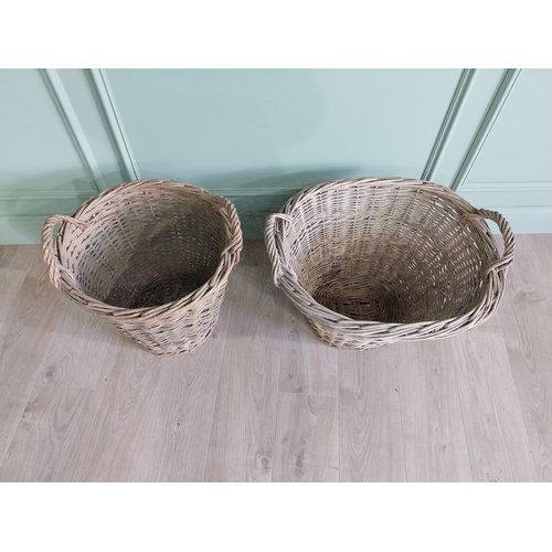 255 - Two early 20th C. wicker baskets {40 cm H x 50 cm W x 48 cm D and 47 cm H x 67 cm W x 54 cm D}.