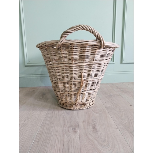 255 - Two early 20th C. wicker baskets {40 cm H x 50 cm W x 48 cm D and 47 cm H x 67 cm W x 54 cm D}.