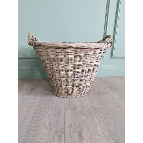 255 - Two early 20th C. wicker baskets {40 cm H x 50 cm W x 48 cm D and 47 cm H x 67 cm W x 54 cm D}.