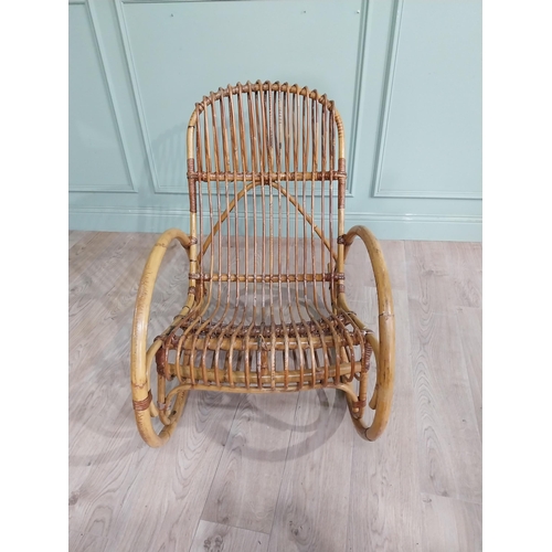 10 - Mid century bamboo rocking chair. {83 cm H x 57 cm W x 100 cm D}.