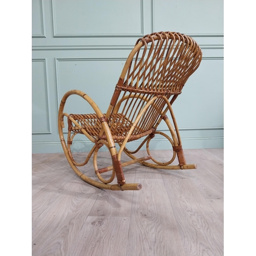 10 - Mid century bamboo rocking chair. {83 cm H x 57 cm W x 100 cm D}.