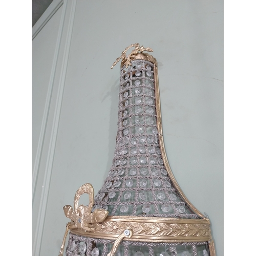 104 - Pair of French brass and crystal glass pear drop wall lights. {68 cm H x 28 cm W x 18 cm D}.