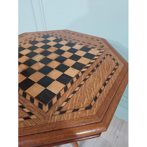 109 - 19th C. Oak and ebony chess table raised on single column with four outswept feet. {77 cm H x 54 cm ... 