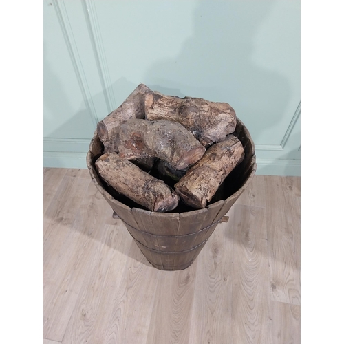 118 - 19th C. pine country house log/peat bucket with metal bound twist bands. {78 cm H x 53 cm Dia.}.