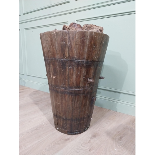 118 - 19th C. pine country house log/peat bucket with metal bound twist bands. {78 cm H x 53 cm Dia.}.