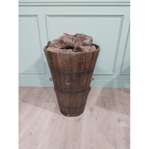 119 - 19th C. pine country house log/peat bucket with metal bound twist bands. {78 cm H x 53 cm Dia.}.