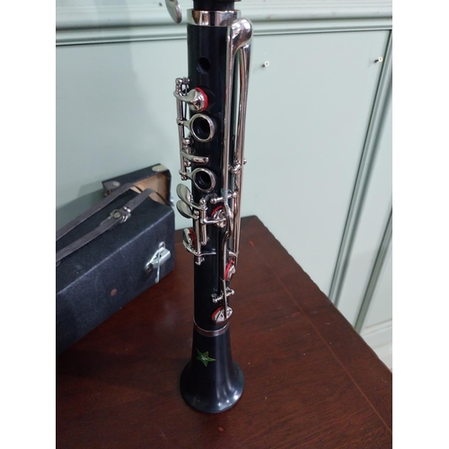 120 - Clarinet in vinyl case. {64 cm L}.