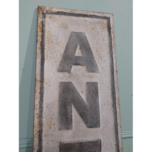 122 - Metal Antique sign. {191 cm H x 33 cm W}.