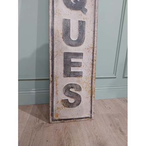 122 - Metal Antiques sign. {191 cm H x 33 cm W}.