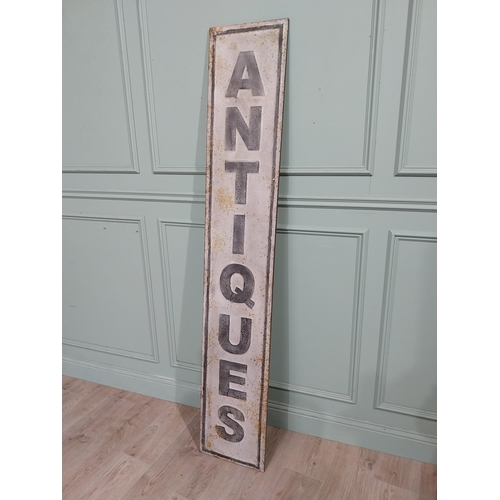 122 - Metal Antique sign. {191 cm H x 33 cm W}.