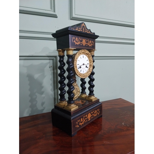 127 - 19th C. French rosewood and satinwood inlaid mantle clock supported by four barley twist columns. {4... 