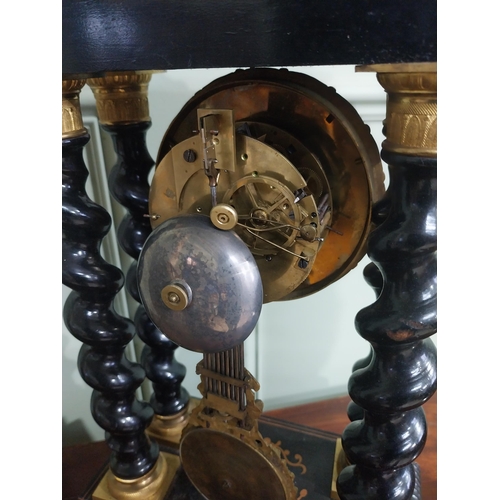 127 - 19th C. French rosewood and satinwood inlaid mantle clock supported by four barley twist columns. {4... 