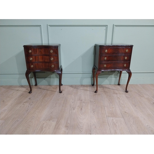 129 - Pair of good quality Edwardian mahogany bedside tables with three drawers raised on cabriole legs. {... 