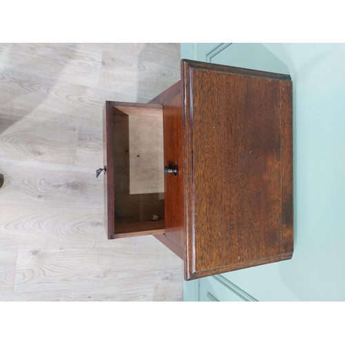 130 - Mahogany four door chest of drawers with decorative handle. {75 cm H x 50 cm W x 35 cm D}.