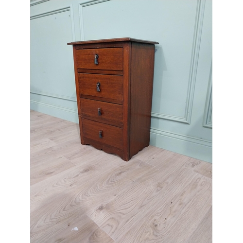 130 - Mahogany four door chest of drawers with decorative handle. {75 cm H x 50 cm W x 35 cm D}.