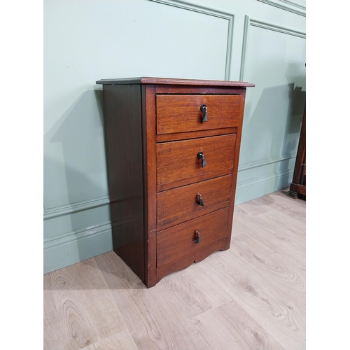 130 - Mahogany four door chest of drawers with decorative handle. {75 cm H x 50 cm W x 35 cm D}.