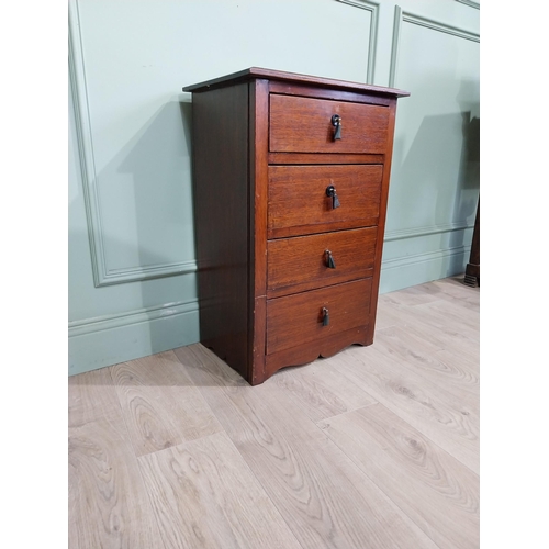 130 - Mahogany four door chest of drawers with decorative handle. {75 cm H x 50 cm W x 35 cm D}.