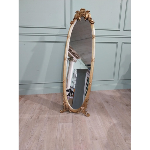 134 - Oval gilt dressing mirror with scroll and leaf decoration in Victorian style {160 cm H x 55 cm W x 5... 