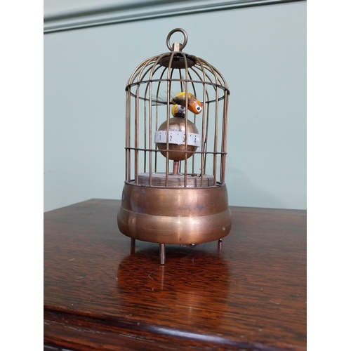 137 - Decorative brass musical bird cage. {17 cm H x 9 cm Dia.}.