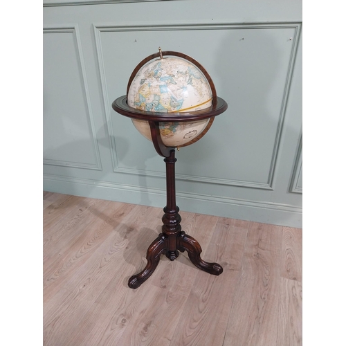 144 - Good quality world globe on mahogany stand. {98 cm H x 40 cm Dia.}.