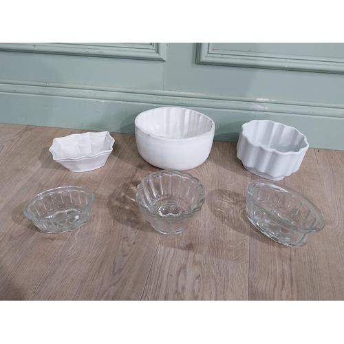 145 - Three early 20th C. Ceramic jelly moulds and three glass moulds. {13 cm H x 20 cm W x 17 to 8 cm H x... 