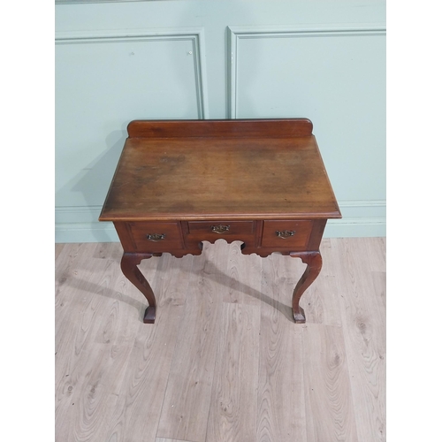 147 - Edwardian walnut lowboy side table with three short drawers in frieze raised on cabriole legs. {79 c... 