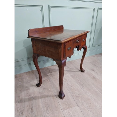 147 - Edwardian walnut lowboy side table with three short drawers in frieze raised on cabriole legs. {79 c... 