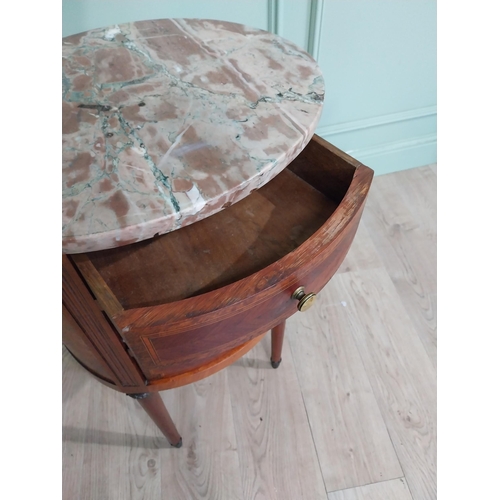 151 - French Edwardian kingwood oval bedside locker with marble top over three short drawers on tapered le... 