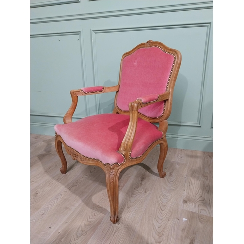 153 - Early 20th C. Pair of carved walnut and upholstered armchairs raised on cabriole legs. {85 cm H x 62... 